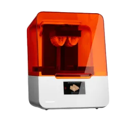 3D printer used for creating custom orthodontic appliances at Hansen Orthodontics, featuring an orange transparent cover and a sleek white base.